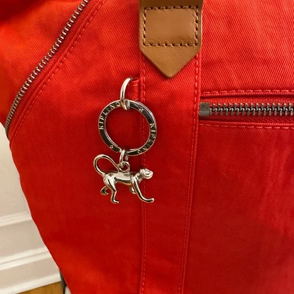 Kipling bright orange bag with brown leather straps - Picture 5 of 12